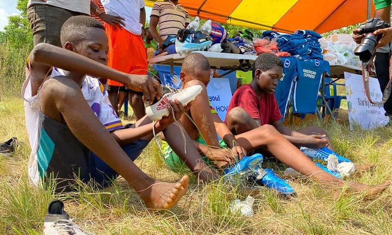 Brighton defender Tariq Lamptey donates boots, food items to kids in Nuaso on Christmas Day
