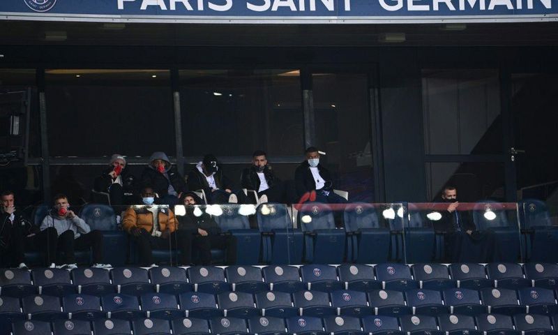 Kylian Mbappe sat next to team-mate Leandro Paredes in the stand as PSG beat Lens
