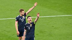 High fives: Scotland earned a 0-0 draw away to England to keep their Euro 2020 hopes alive