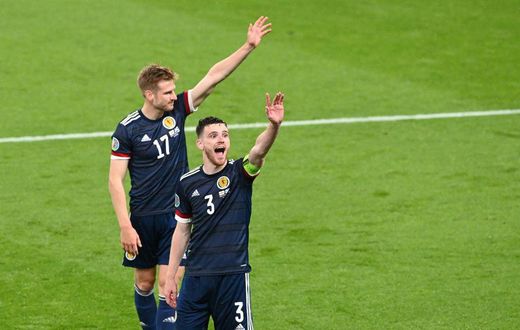 High fives: Scotland earned a 0-0 draw away to England to keep their Euro 2020 hopes alive