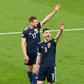 High fives: Scotland earned a 0-0 draw away to England to keep their Euro 2020 hopes alive