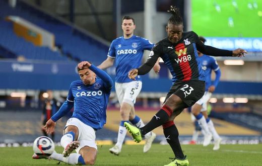 Bat man: Michy Batshuayi (right)dealt a blow to Everton's European hopes with a late equaliser for Crystal Palace