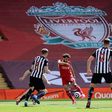 Mohamed Salah (2L) puts Liverpool ahead in a 1-1 draw against Newcastle United at Anfield