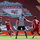 Mohamed Salah (2L) puts Liverpool ahead in a 1-1 draw against Newcastle United at Anfield