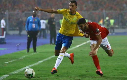Brazilian Ricardo Nascimento (L) scored first for leaders Mamelodi Sundowns in a 3-0 South African Premiership triumph at Orlando Pirates Sunday.