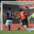 Nigerian striker Terem Moffi (C) scored a hat-trick to move Lorient four points clear of the relegation play-off place