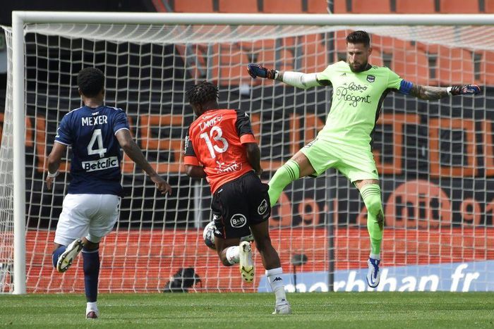 Nigerian striker Terem Moffi (C) scored a hat-trick to move Lorient four points clear of the relegation play-off place