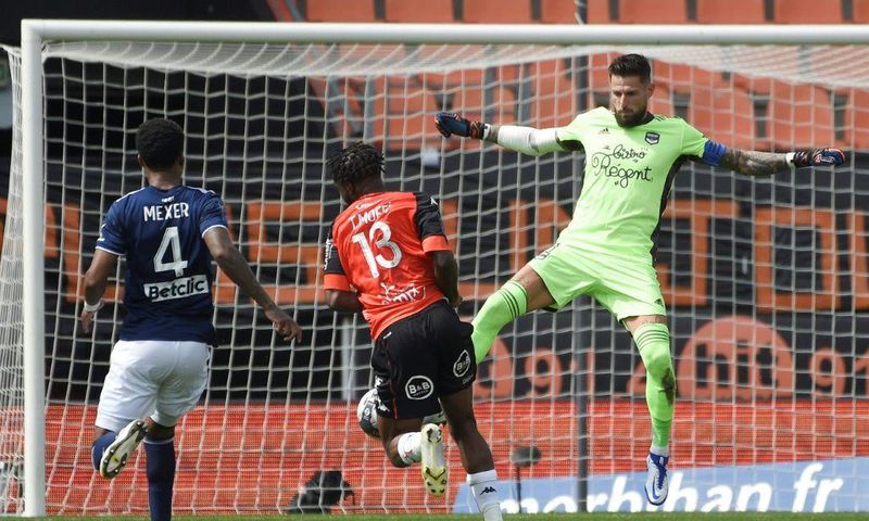 Nigerian striker Terem Moffi (C) scored a hat-trick to move Lorient four points clear of the relegation play-off place