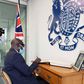 A-G Godfred Dame signs Prince Philip's book of condolence in Accra