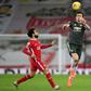Manchester United captain Harry Maguire (right)expects his side to inflict more pain on Liverpool come Sunday