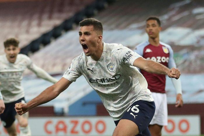 Manchester City midfielder Rodri celebrates scoring at Aston Villa