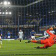Spot on: Gylfi Sigurdsson (left)opened the scoring for Everton against Chelsea