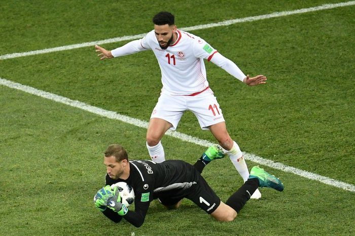 Esperance goalkeeper Farouk Ben Mustapha (L) playing for Tunisia against England at the 2018 World Cup in Russia.