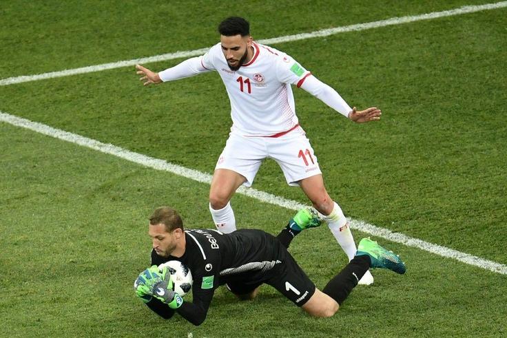 Esperance goalkeeper Farouk Ben Mustapha (L) playing for Tunisia against England at the 2018 World Cup in Russia.