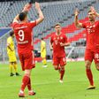 Robert Lewandowski (3rd L) celebrates scoring for Bayern Munich against Cologne on Saturday
