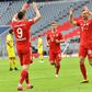 Robert Lewandowski (3rd L) celebrates scoring for Bayern Munich against Cologne on Saturday