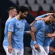 Manchester City players congratulate Riyad Mahrez after his free-kick gave the English side a 2-1 win in Paris