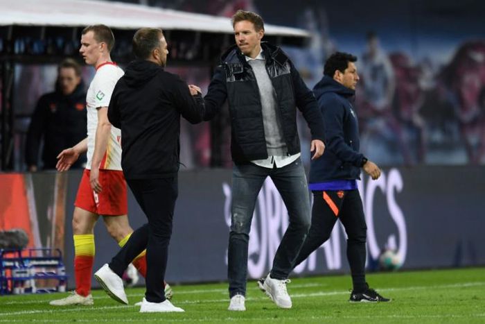 RB Leipzig coach Julian Nagelsmann (right) has been tipped to replace Hansi Flick (left) as head coach of Bayern Munich