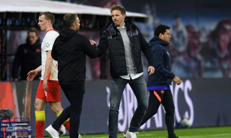 RB Leipzig coach Julian Nagelsmann (right) has been tipped to replace Hansi Flick (left) as head coach of Bayern Munich