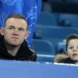 Former Manchester United forward Wayne Rooney pictured with his son, Kai, in 2015