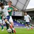 US winger Christian Pulisic (C) vies with Northern Ireland defender Daniel Ballard