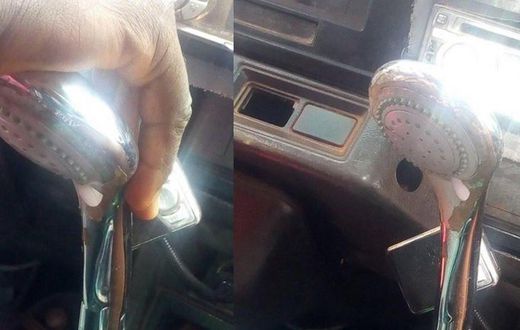 Trotro driver uses showerhead as a gear stick knob for the rickety vehicle