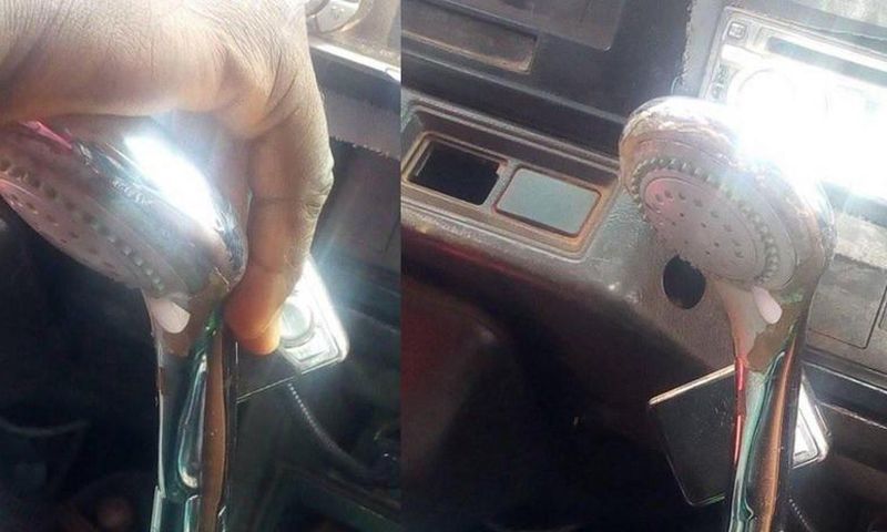 Trotro driver uses showerhead as a gear stick knob for the rickety vehicle