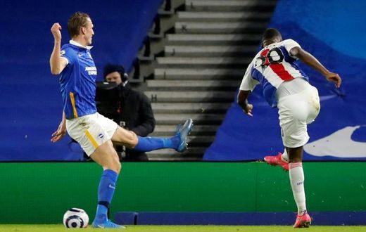Benteke brilliance: Christian Benteke (right) snatched a 2-1 win for Crystal Palace away to Brighton on Monday