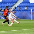 Lyon's Brazilian midfielder Bruno (2ndL) scored a double against Lorient