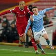 Manchester City midfielder Phil Foden (R) shone against Liverpool