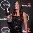 US footballer Alex Morgan says she and other family members have tested positive for Covid-19