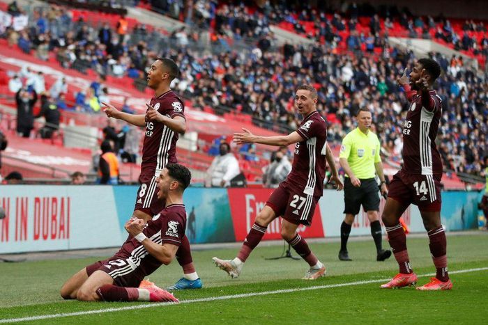 Leicester players and fans celebrate Youri Tielemans's (top left) winner against Chelsea in the FA Cup final