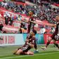 Leicester players and fans celebrate Youri Tielemans's (top left) winner against Chelsea in the FA Cup final