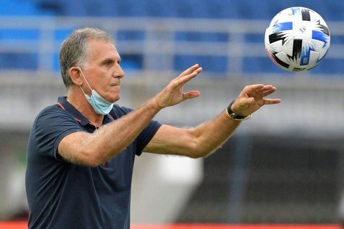 Colombia coach Carlos Queiroz acts as a 'ball boy' during a World Cup qualifier against Ecuador last November.