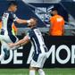 Maximiliano Meza of Mexico's Monterrey celebrates with a teammate after scoring against US club Columbus Crew in a CONCACAF Champions League quarter-final victory