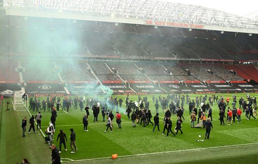 Supporters protesting against Manchester United's owners invaded the pitch at Old Trafford