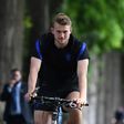 Matthijs de Ligt riding a bike at the Netherlands team training camp in Zeist on Saturday