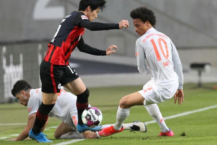 Frankfurt's Japan midfielder Daichi Kamada (L) scored the opening goal against Bayern Munich on Saturday