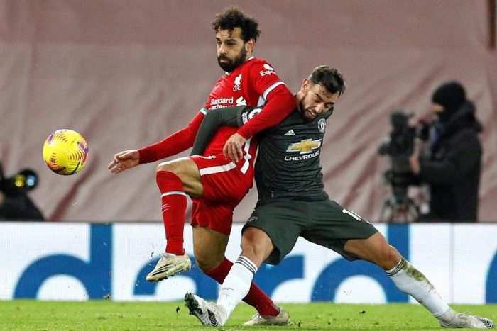 Stalemate: Mohamed Salah (left)and Bruno Fernandes (right)failed to break the deadlock in a 0-0 draw between Liverpool and Manchester United