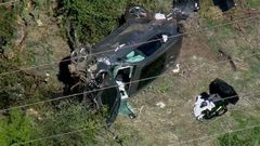 Mr. Woods was extricated from the wreck by local police