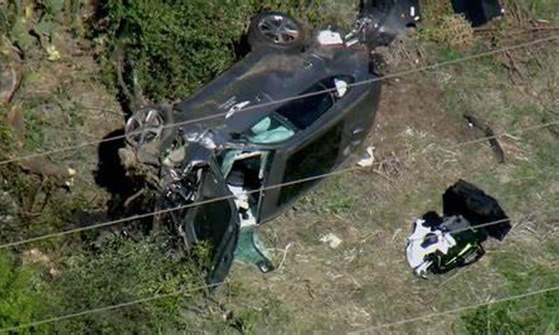 Mr. Woods was extricated from the wreck by local police