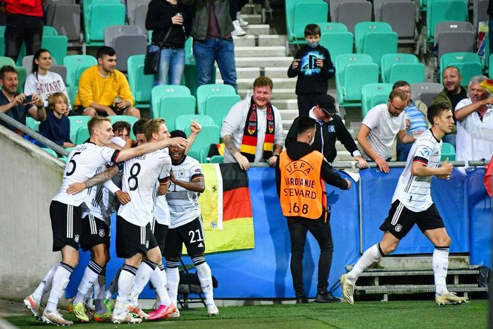 Germany players celebrate after Lukas Nmecha scored against Portugal in the Under-21 Euro final in Ljubljana