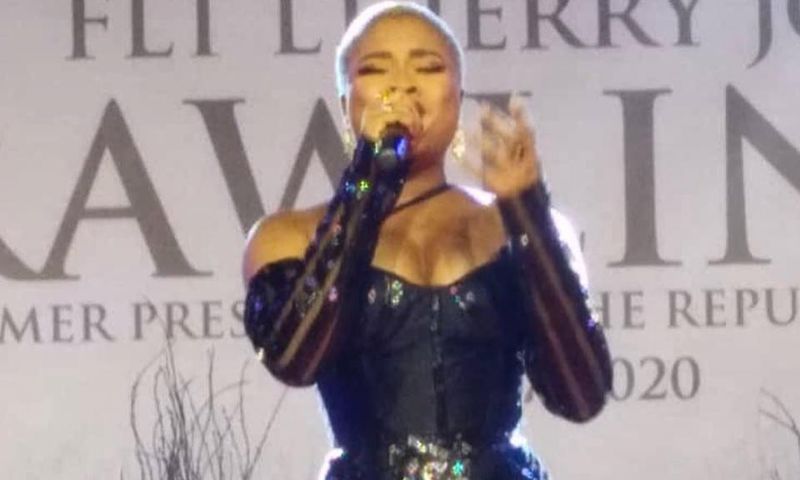 Adina tears down during emotional performance at Rawlings' vigil