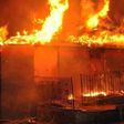 Fire razes shops at plank section of boundary market, Ajegunle. (Guardian)