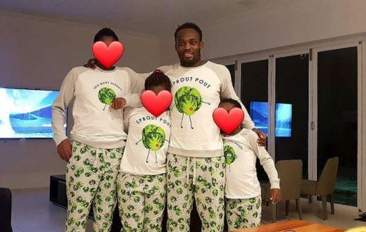 Michael Essien with his children