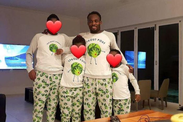 Michael Essien with his children