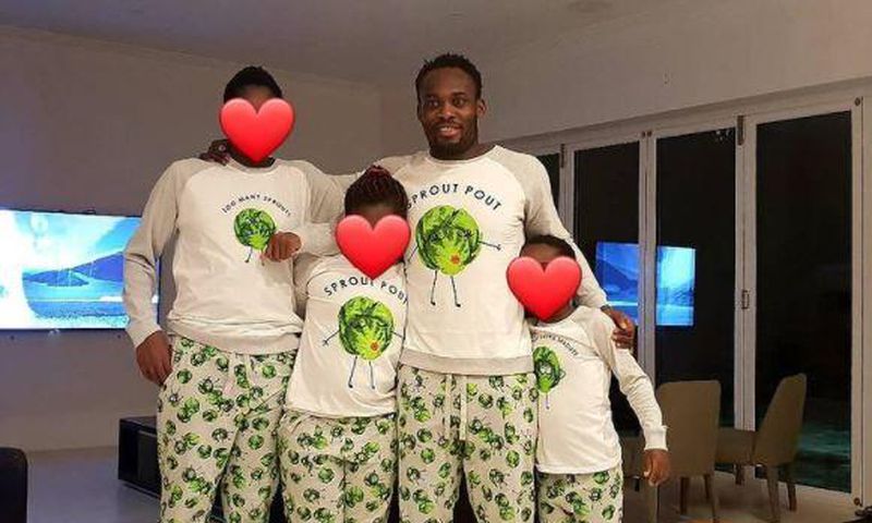 Michael Essien with his children