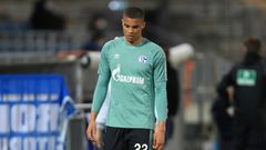 Schalke defender Malick Thiaw is sent off as defeat at Arminia Bielefeld confirmed his club's relegation