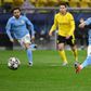 Manchester City midfielder Riyad Mahrez converts the second-half penalty against Dortmund