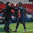 Pochettino celebrates his first win, 3-0 against Brest, with striker Moise Kean